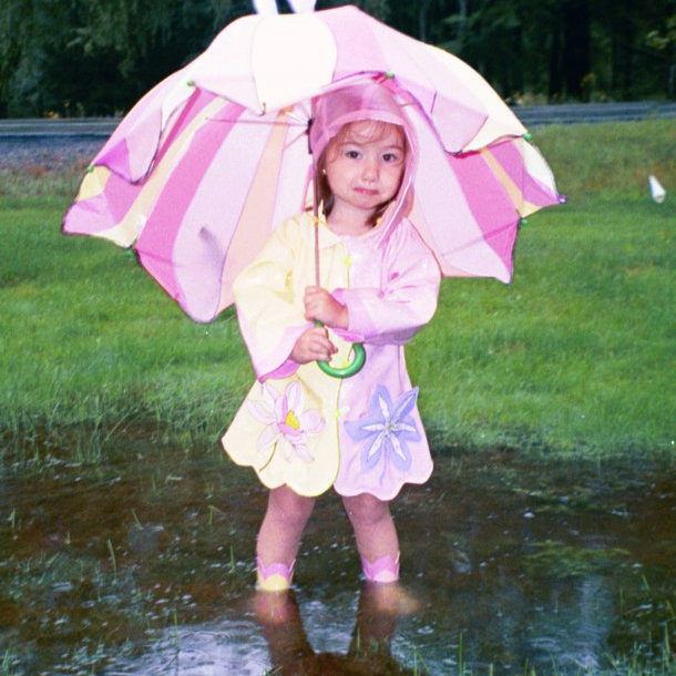 Little Girl in Wet Yard